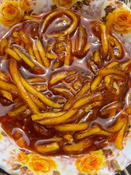 A bowl of my signature `khatti meethi` mango chutney, ready to be served. It has that perfect balance of sweet and sour, made with a traditional recipe and no artificial preservatives.