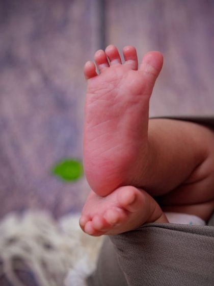 Ten tiny toes. This close-up shot of a baby's feet is a simple, yet powerful reminder of just how small and perfect they are.