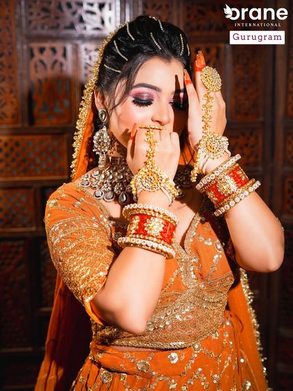 This image focuses on the traditional hand jewelry and bangles, showing how they coordinate with the overall bridal makeup. Understanding cultural details is a key part of my curriculum.