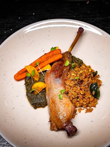 A beautifully plated dish from the 'Forgotten Greens' menu, showcasing how we can turn overlooked ingredients into a gourmet experience.