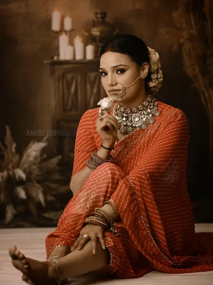 A full-length artistic portrait from the same series, showcasing the beautiful drape of the saree and the subject's graceful pose.