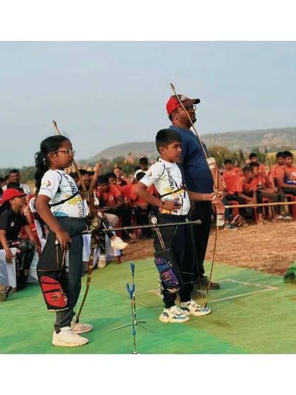 Our Under 9 state championship medalists standing with their coach. We believe in starting early and providing a strong foundation for a long and successful archery career.