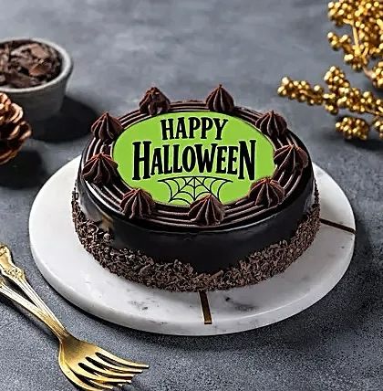Get into the spooky spirit with our Happy Halloween chocolate cake. The vibrant green edible print and rich chocolate flavor make it a wickedly good treat.