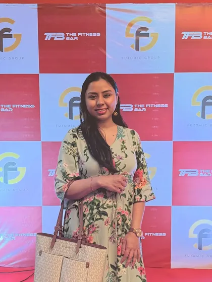 Posing at the photo wall during the launch of The Fitness Bar. It's great to have a new fitness spot in the area.