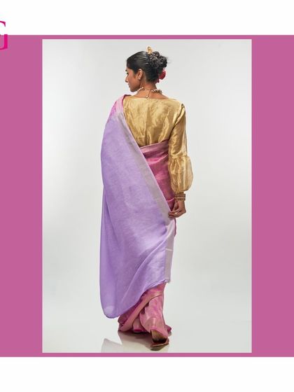 A back view showcasing the beautiful contrast between the mauve body, lavender pallu, and golden blouse.