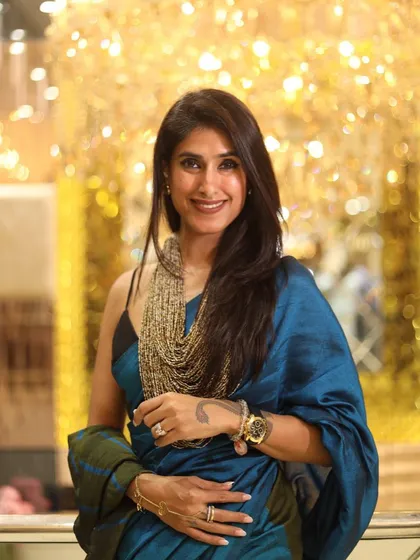 A beautiful saree can make you feel like royalty. This is one of my favorite looks, a stunning blue silk saree paired with a statement necklace, perfect for a festive occasion.