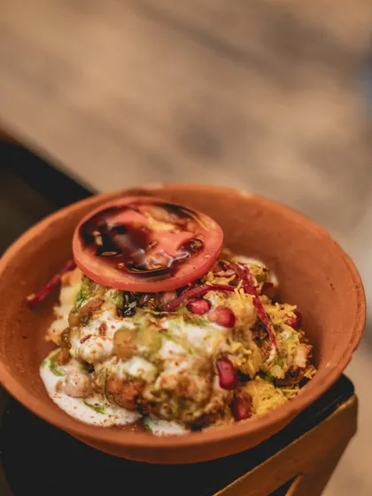 We love to innovate with classic flavours. This dish reimagines Indian street food with our Potato Roesti Chaat, a modern interpretation that combines familiar tastes with a gourmet presentation, served in an earthy kulhad bowl.