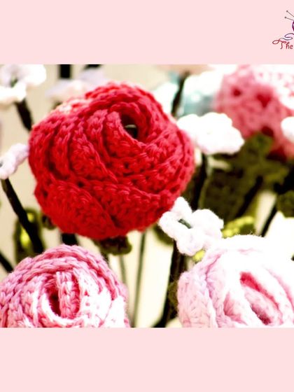 The centerpiece of the bouquet, this vibrant red crochet rose shows the intricate spiral pattern I use to create a realistic look.