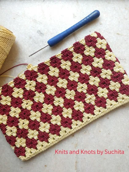 Here is a work-in-progress shot of the checkerboard pattern. Seeing the design come together stitch by stitch is a part of the process I truly enjoy. This is how each handmade piece begins.