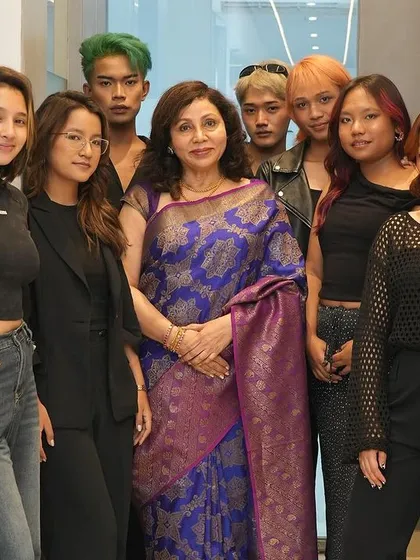 Our founder with a group of our talented students and models at the HRBR launch event. We are a community of creative and passionate individuals.
