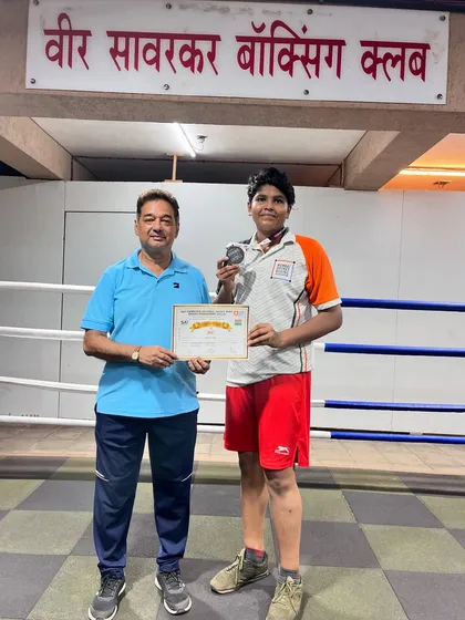 Celebrating another victory with my boxer Jagruti. Consistency is key, and we work to make winning a habit.