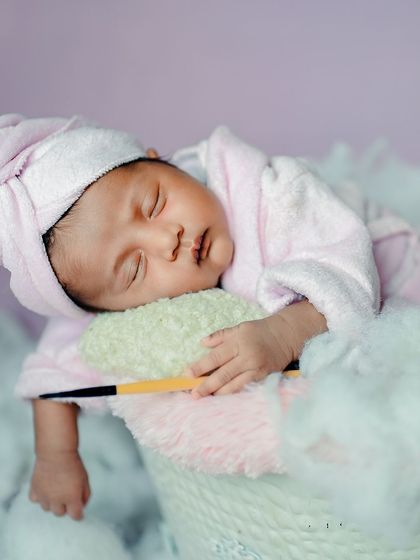 A close-up of the newborn spa theme, capturing the baby's peaceful expression as they 'relax'.