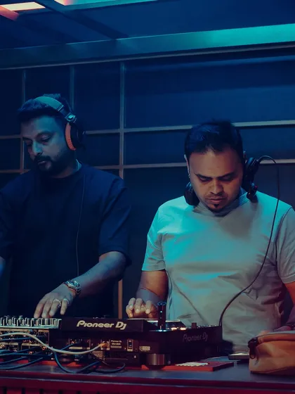 Back-to-back with DJ Varun at Gawky Goose. We have great chemistry on the decks, and our sets are always a high-energy blend of our styles.
