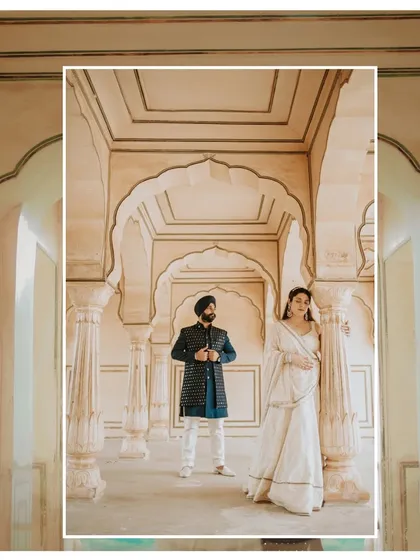 Capturing the essence of a royal Indian wedding, this couple stands amidst the stunning architecture of a Jaipur palace. This is for couples who dream of a heritage wedding filled with elegance.