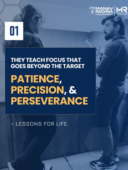 We believe in teaching lessons for life, not just for sport. A coach is seen here in a focused discussion with a shooter, instilling the values of patience, precision, and perseverance.