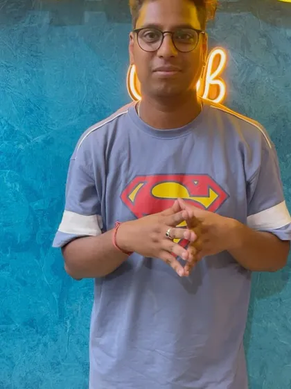 Rocking a Superman tee in our theatre, this customer is ready for an epic movie marathon. Our comfy seating and big screen are perfect for binge-watching your favorite superhero sagas.
