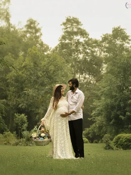 Another beautiful moment from the same outdoor picnic-themed shoot, with the couple sharing a happy, candid moment.