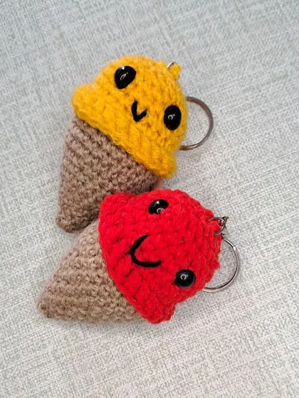 Another view of the ice cream cone keychains, showing their happy little faces.