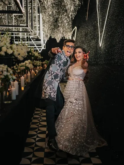 The pure energy and fun of a Sangeet night, as the couple makes a grand, joyful entrance.