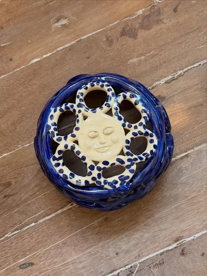 This student's quiet patience and steady curiosity shine through in these beautiful pieces from her beginner's course. The whimsical koi pond platter is a favorite, full of texture and calm joy.