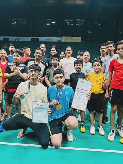 Our SFA Championship medalists, Adrian and Puranjay, celebrating with their fellow junior players, inspiring the next generation.