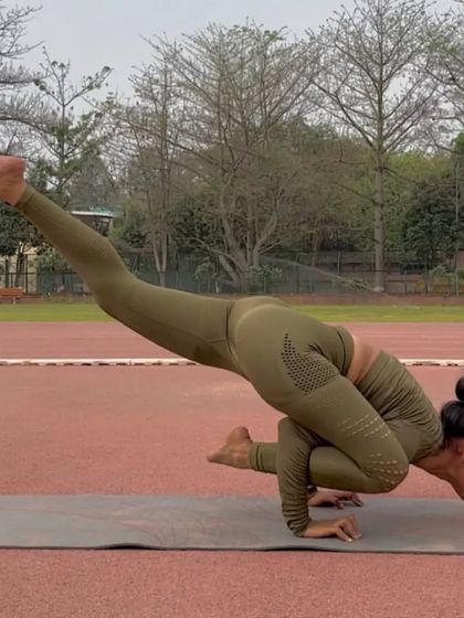 Eka Pada Koundinyasana II is a challenging arm balance that involves a twist. It builds incredible upper body and core strength while also stretching the hamstrings.