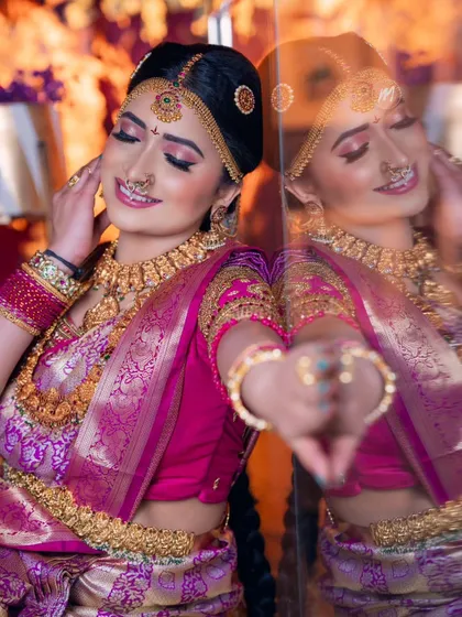 A playful and happy shot from the Telugu bridal demo, showing the makeup in motion.