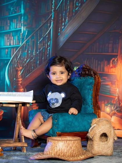 Another angle of the library shoot, showing more of the enchanting backdrop.