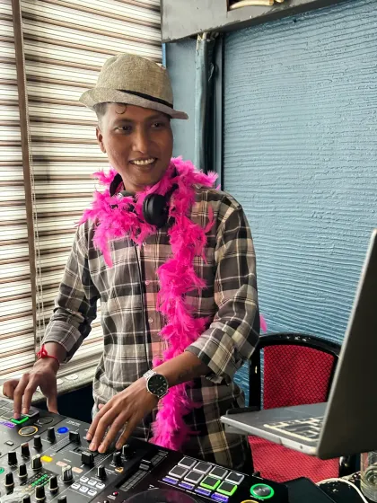 Getting into the spirit of a retro theme party with props. I believe in creating a fun, interactive atmosphere that goes beyond just playing music.