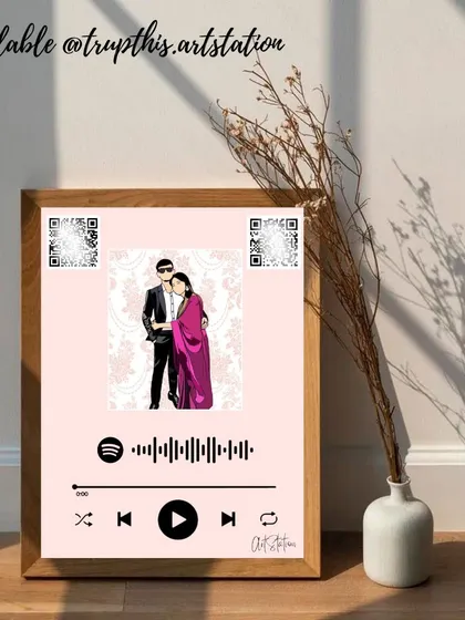 A beautifully staged photo of an illustrated Spotify frame for a couple. Along with the song code, I can also add QR codes that link to a private photo album or a special video message.