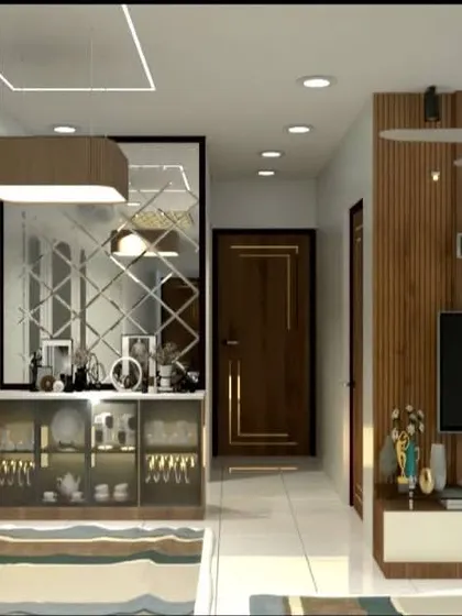 A full view of the living and dining space in this 2BHK flat. We used a combination of mirror panels and classic wall molding to create an illusion of space and add a touch of luxury.