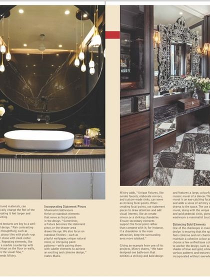 A glimpse into another one of our bathroom designs featured in a magazine. This space uses dramatic lighting and reflective surfaces to create a feeling of grandeur and luxury.