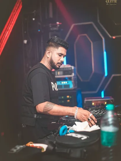 A candid shot from behind the decks at Glitte Superclub. It's about staying focused while managing the energy of a packed room.