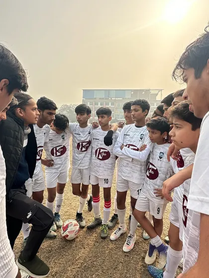 A pre-game huddle where our coach gives final instructions. We ensure our players are tactically prepared and mentally focused for every match.