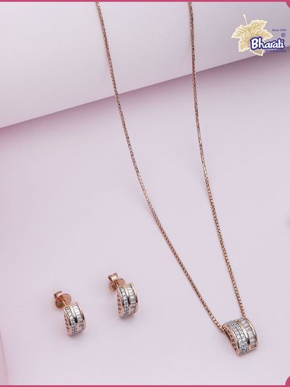 A timeless and affordable set for daily elegance. This rose gold pendant and matching stud earrings feature a classic design with rows of brilliant diamonds, offering style that shines.
