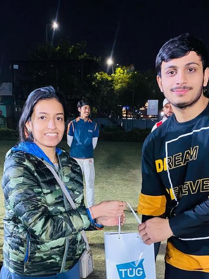 A young player from the winning team receives his prize. Our tournaments are a great experience for players of all ages.