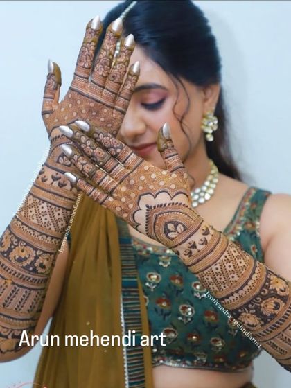 A lovely design for a bride who prefers patterns over portraits, featuring beautiful heart-shaped motifs and floral bands.