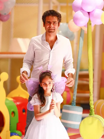 A proud father with his daughter, the birthday fairy. We love celebrating these special family milestones.