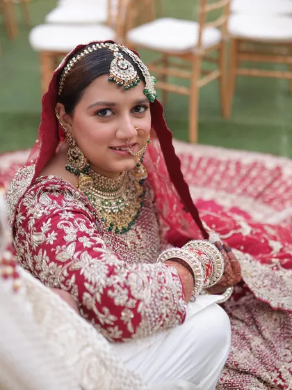 For Saba's Nikkah, she wished for a minimal and fresh look with no heavy lashes or kajal. We focused on an even-toned, radiant base that highlighted her natural beauty, paired with a sleek bun for a clean and timeless bridal look.