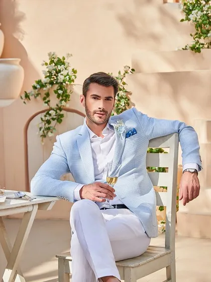 Perfect for a destination wedding or a summer day event, this look captures effortless charm. I crafted this suit from a textured Arctic Blue Irish linen, ensuring it's as comfortable as it is stylish. The relaxed yet sharp fit is ideal for celebrating under the sun.