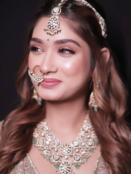 Another close-up showcasing the flawless makeup and heavy jewellery that you can rent from us to complete your look.