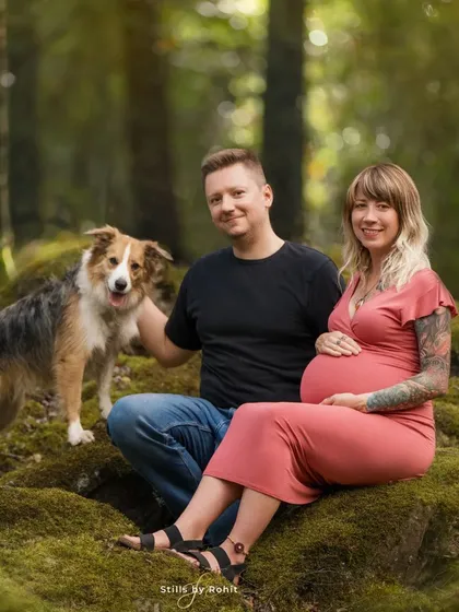 For families who love the outdoors, I find beautiful natural spots where we can capture your story. This portrait in the woods shows the joy and anticipation of the whole family, dog included.