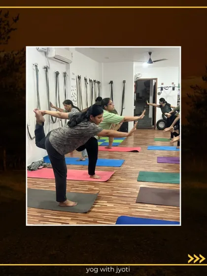 Students practicing Natarajasana, finding their balance and grace in this beautiful standing pose.