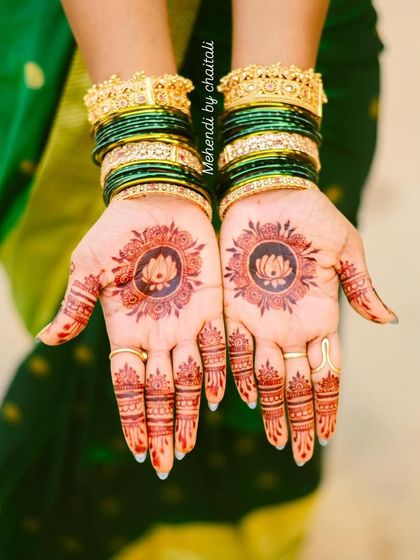 For a more minimalist engagement look, a beautiful lotus mandala on the palm provides an elegant touch. The rich stain from my organic henna looks stunning.