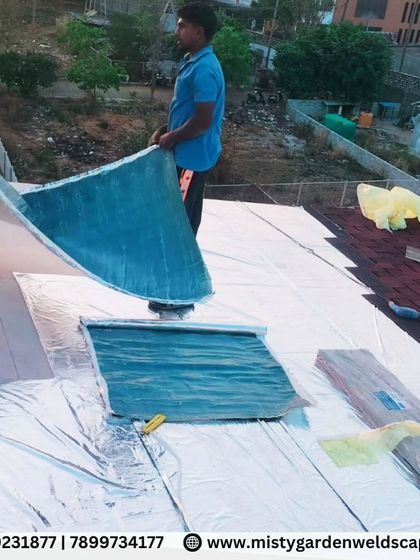 Laying the underlayment membrane before installing the shingles. This is a critical step for waterproofing and ensuring the longevity of the roof.