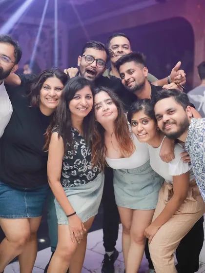 A happy group of friends enjoying the music and each other's company.