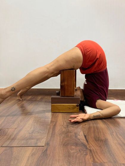 Supported Halasana (Plow Pose). The generation of prana in the human system can be compared to the generation of electrical energy. The chakras act as transformers, distributing this energy throughout the system.