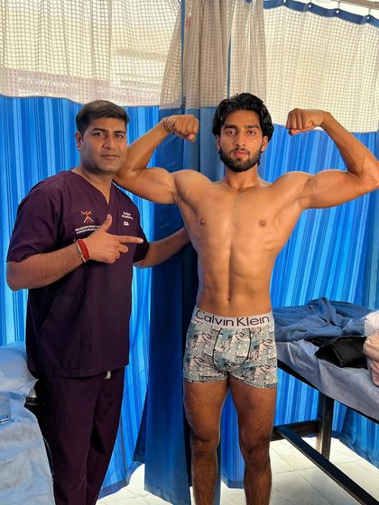 A client posing after his muscle recovery session.