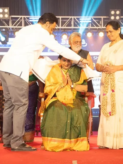 Being felicitated at the Shivaratri Utsava organized by the Dr. Ashwathnarayana foundation. Community support and recognition are vital for the arts to thrive.