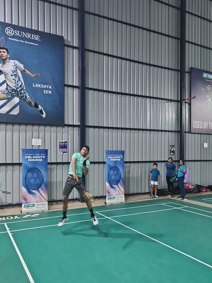 An adult player executes a jump smash during the demo day. My academy and events cater to players of all ages who are passionate about improving their game.